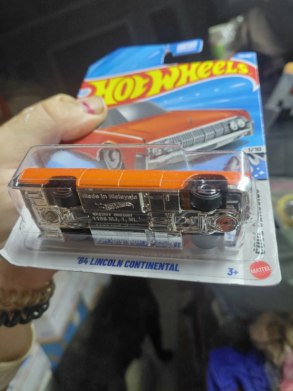 orange Hot Wheels '64 Lincoln Continental from the 2026 mainline series featurin